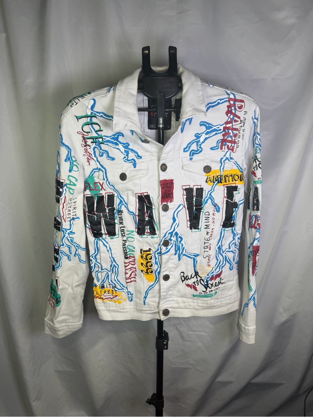 White Graffiti-Print Denim Jacket with Blue Lightning Accents